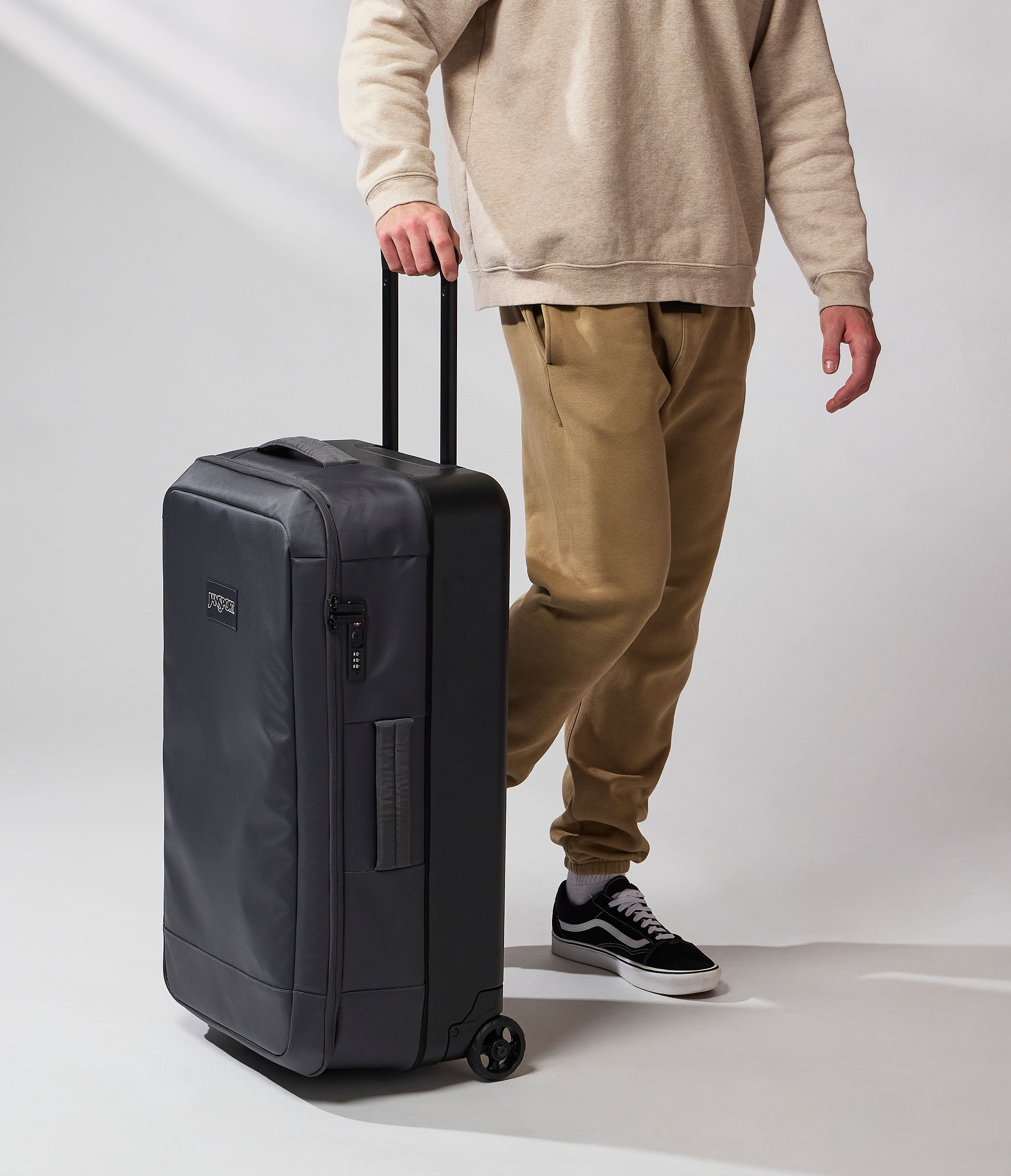 JanSport Good Latitude Wheeled Duffel in Smokey Grit — angle view 2