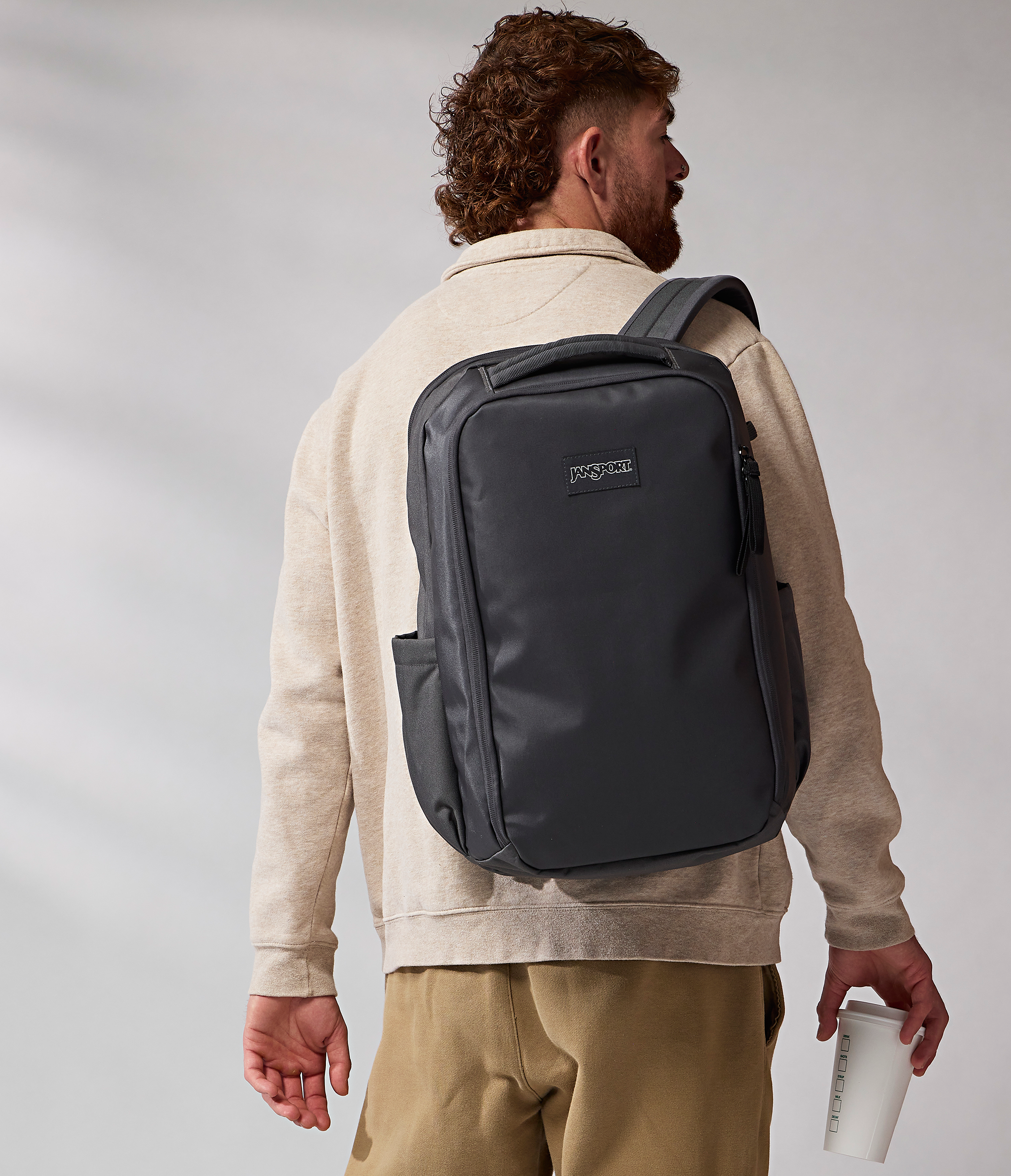 JanSport Good Latitude Travel Pack 30L in Smokey Grit — angle view 2