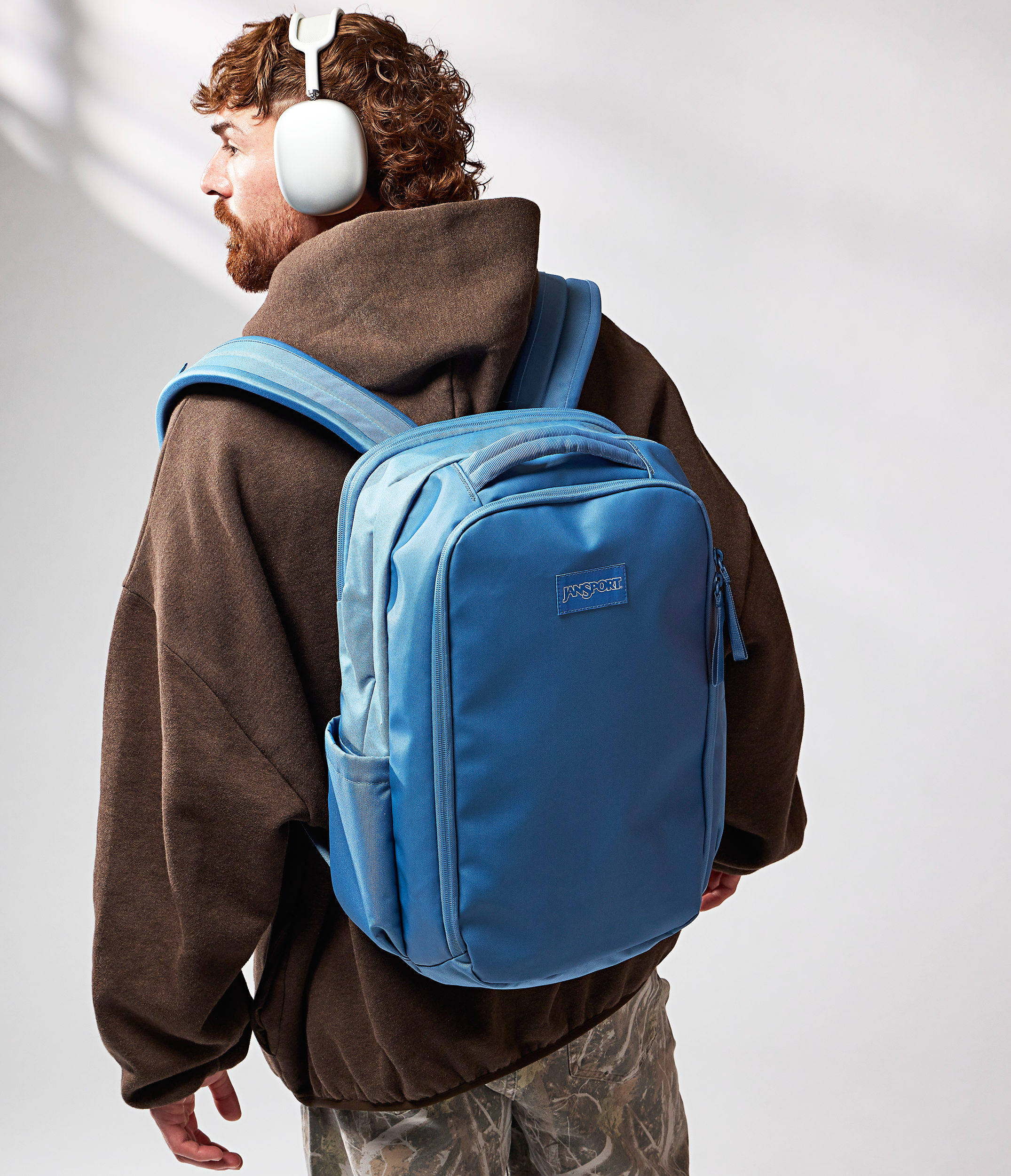 JanSport Good Latitude Travel Pack 30L in Elemental Blue — angle view 2