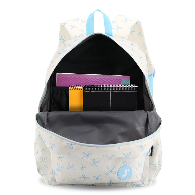 J World Oz Daypack Backpack in Blue Bows — front view 2 # color_Blue Bows