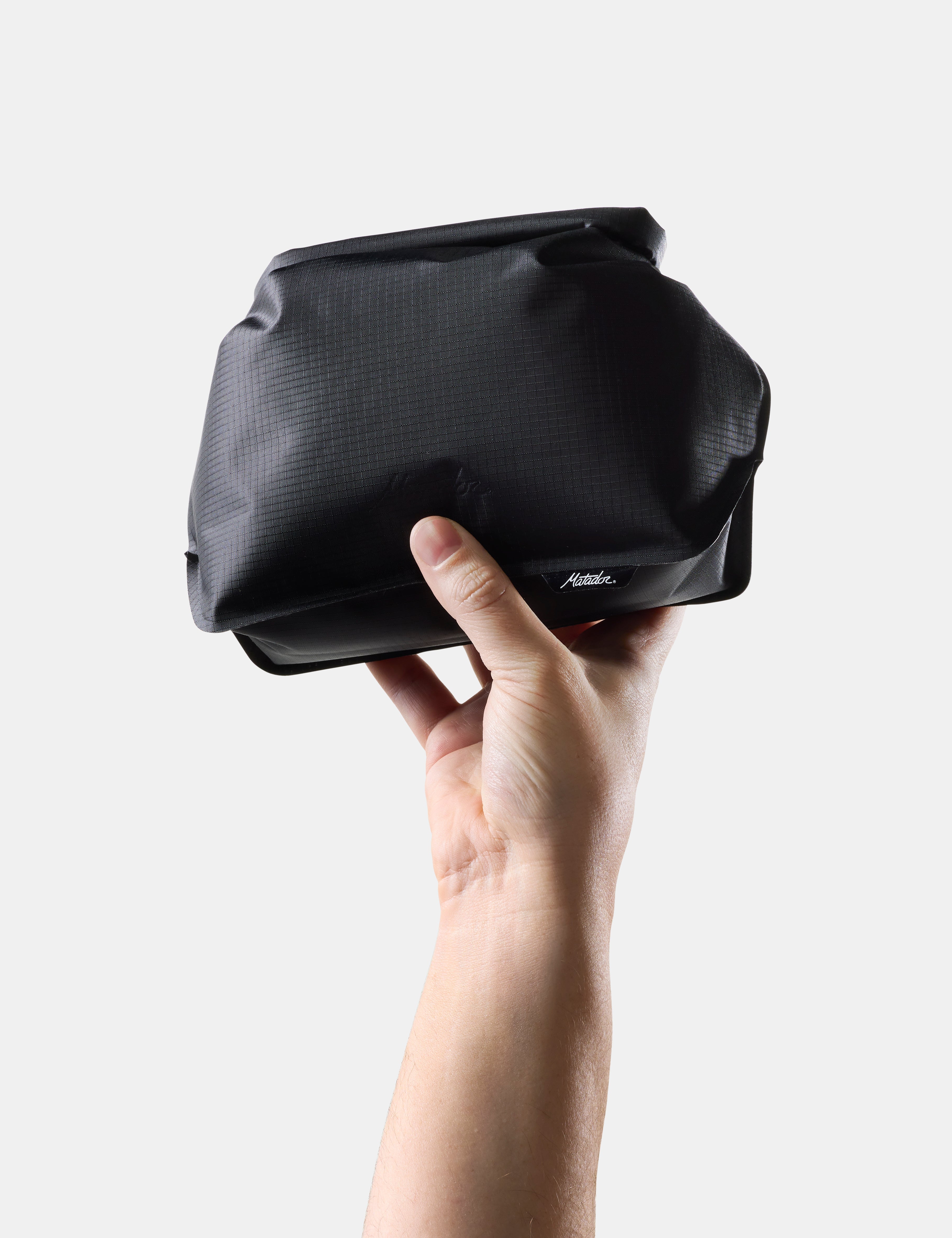 Matador FlatPak Waterproof Toiletry Case in Black — angle view 2 # color_Black