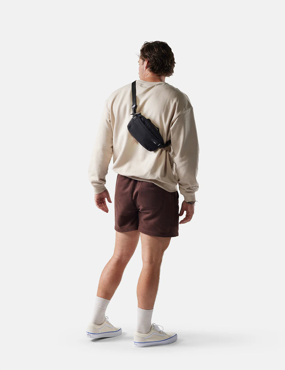 Matador ReFraction Packable Sling in Black — lifestyle 2 # color_Black