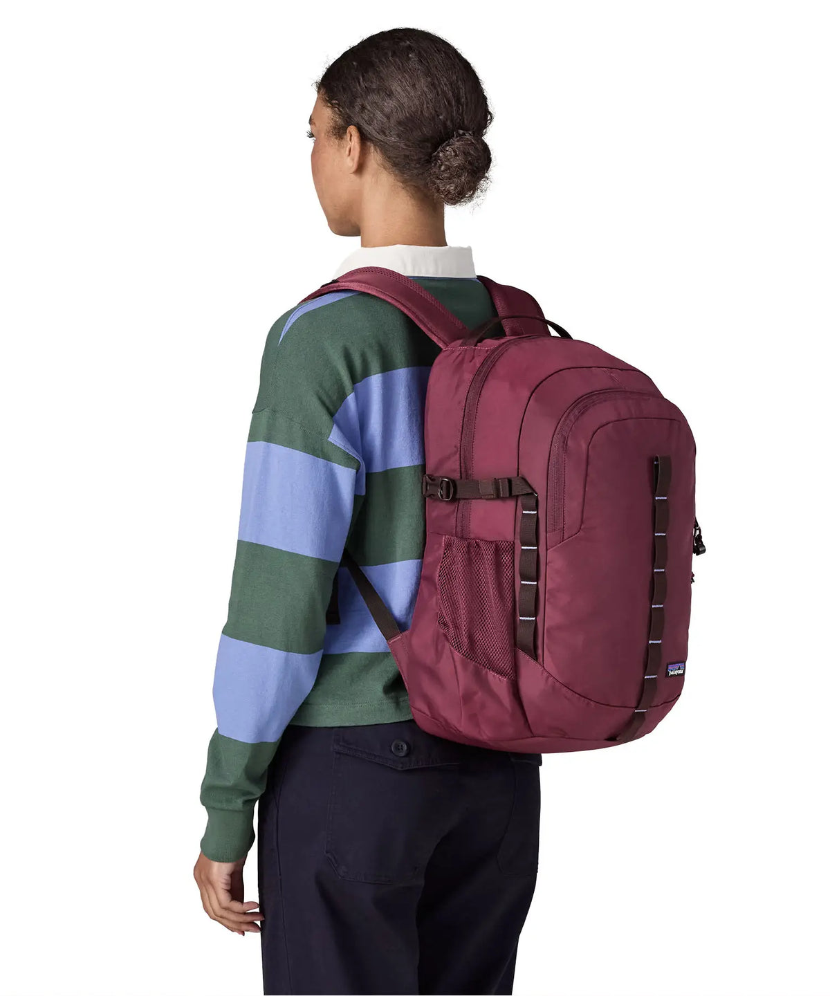 Patagonia Refugio Daypack 26L in Berry Fig — lifestyle