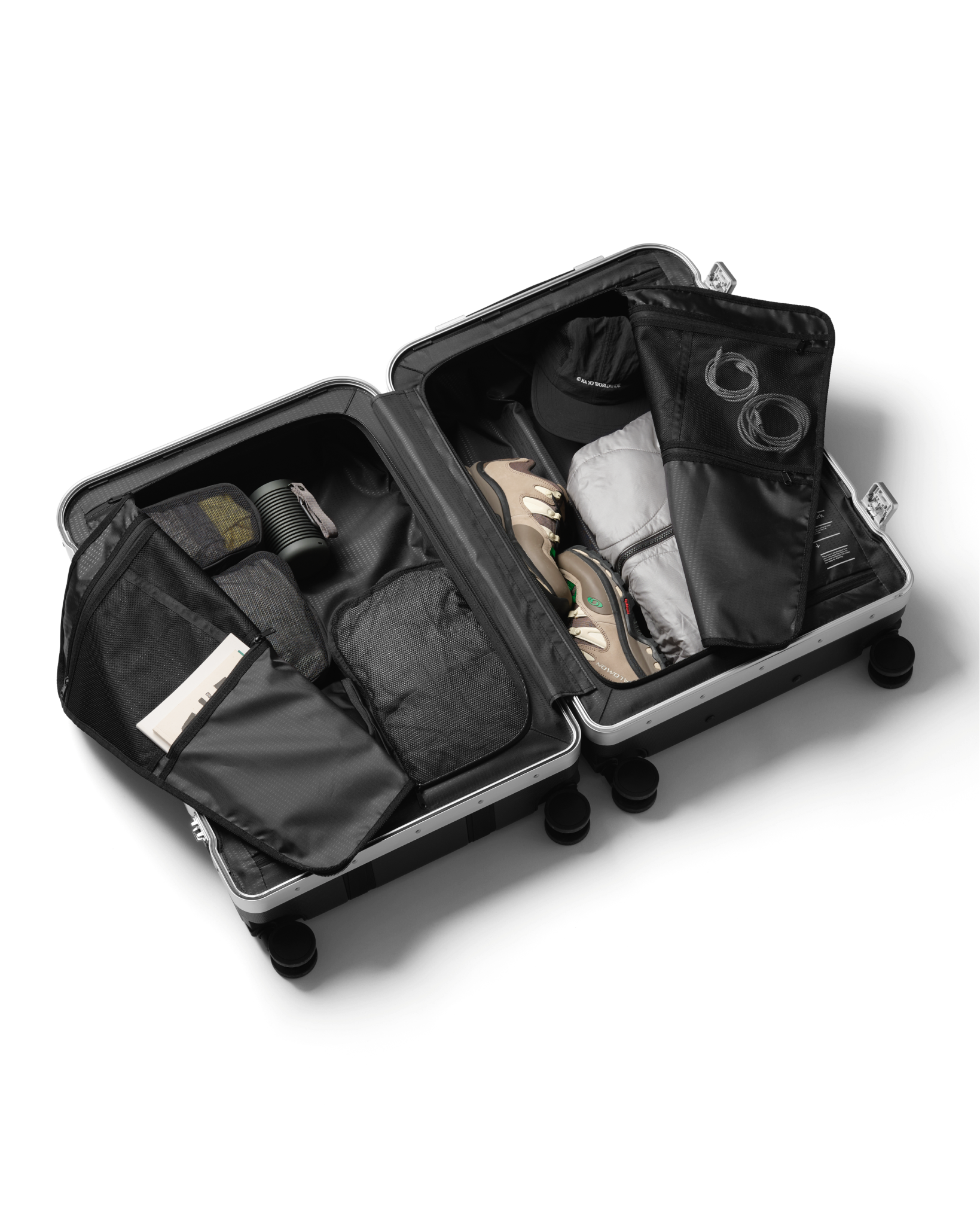Db Journey Ramverk Pro Check-in Luggage Large in Silver — packed view # color_Silver