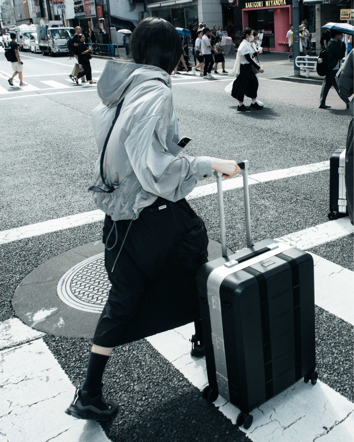 Db Journey Ramverk Pro Check-in Luggage Medium in Black Out — lifestyle # color_Black Out