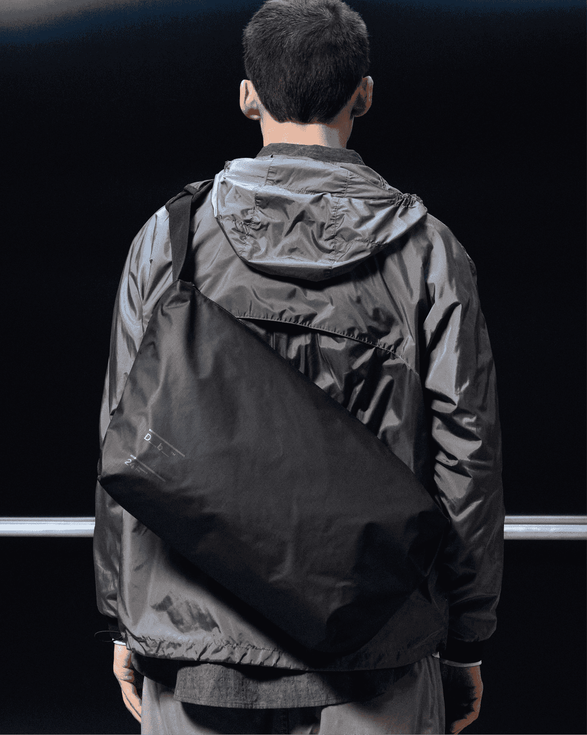 Db Journey Ramverk Pro Sling Bag 24L in Black Out — lifestyle # color_Black Out