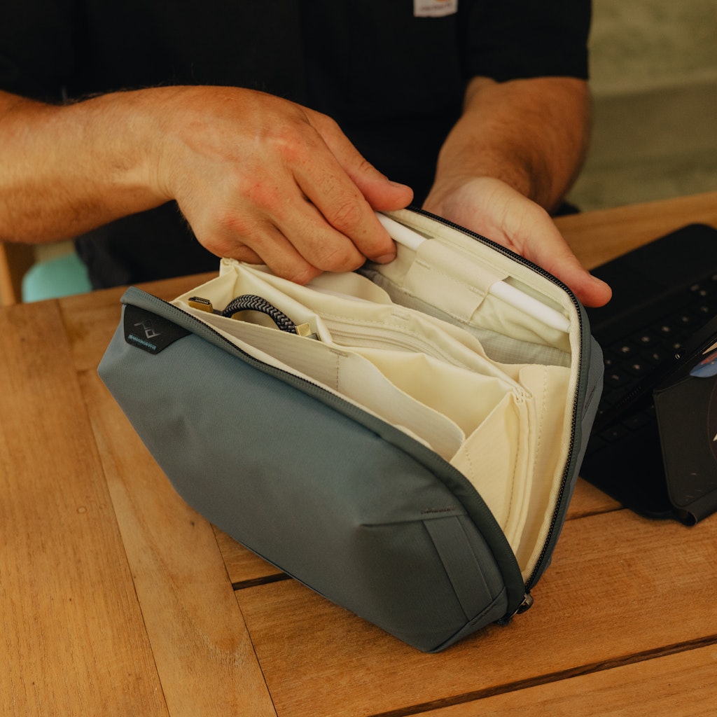 Peak Design Tech Pouch in Ocean — lifestyle