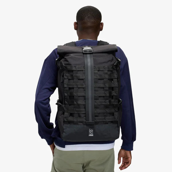 Chrome Industries Barrage 34L backpack – person wearing the backpack, rear view