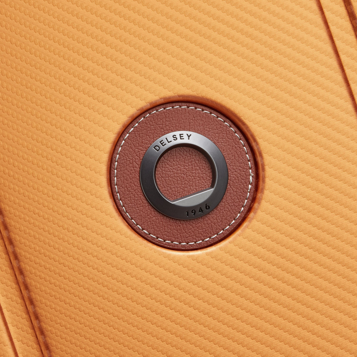 Delsey Alu'r Aluminum Large Spinner Upright in Orange — detail view # color_Orange