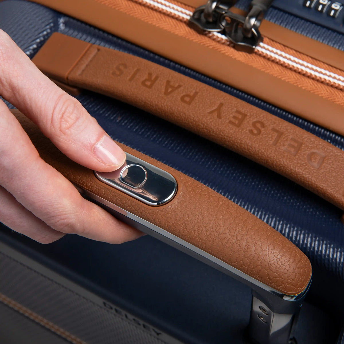 Delsey Chatelet Air 2.0 23-Inch Carry-On Spinner in Navy — lifestyle