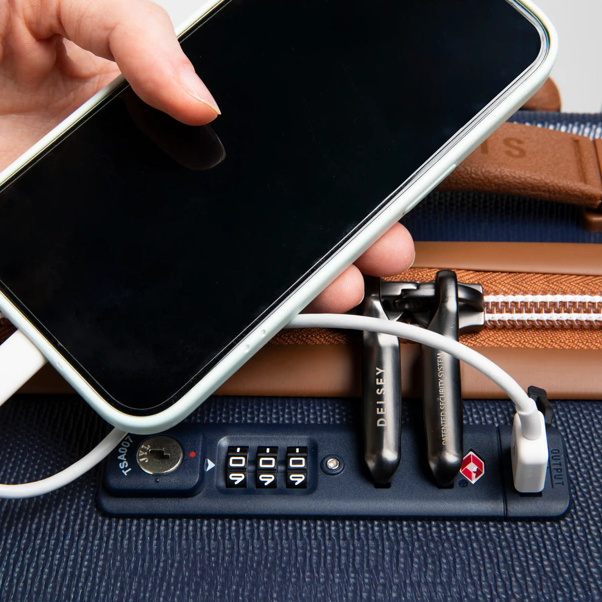 Delsey Chatelet Air 2.0 23-Inch Carry-On Spinner in Navy — lifestyle 3