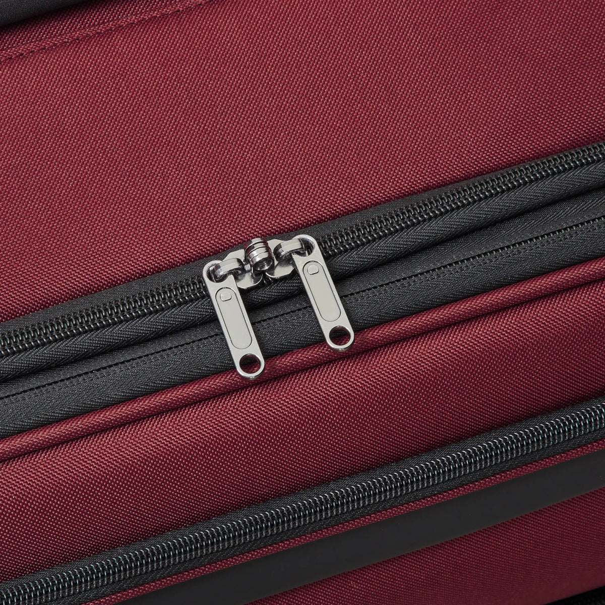 Delsey Sky Max 3.0 Medium Check-In Expandable Spinner in Burgundy — detail view 3 # color_Burgundy