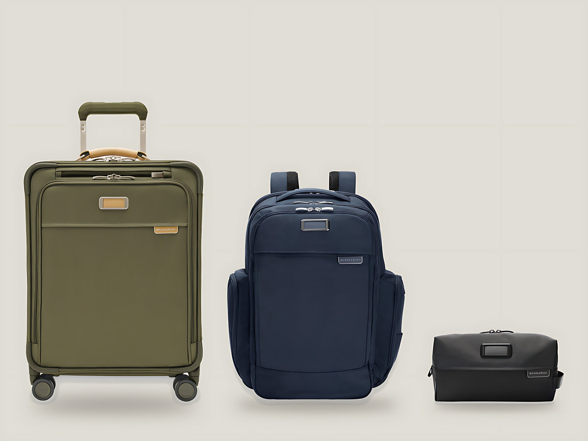 A Briggs & Riley carry-on, backpack and toiletry kit together as one set