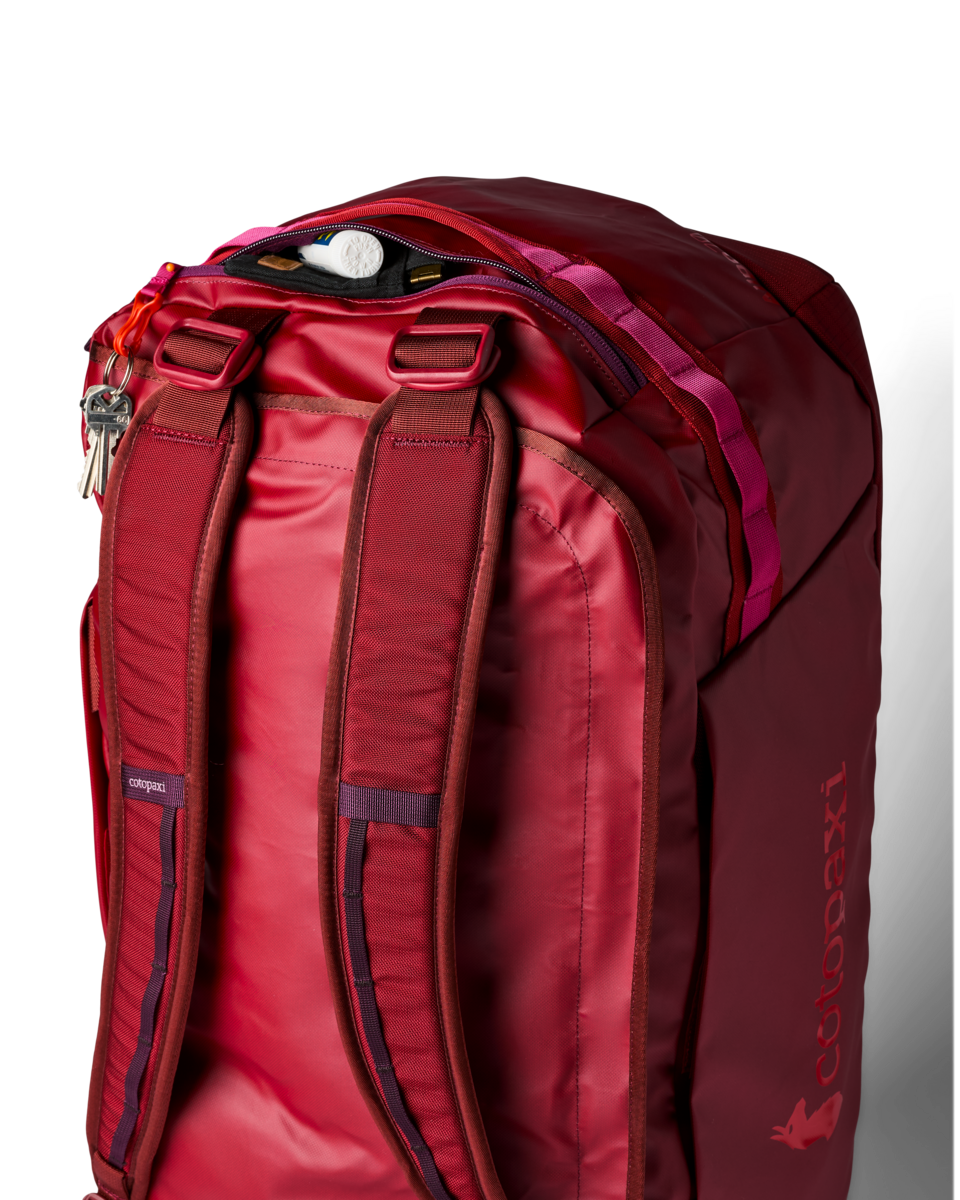 Cotopaxi Allpa Getaway 70L Duffel in Crimson — angle view 3