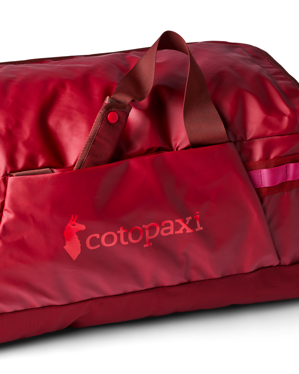 Cotopaxi Allpa Getaway 70L Duffel in Crimson — detail view
