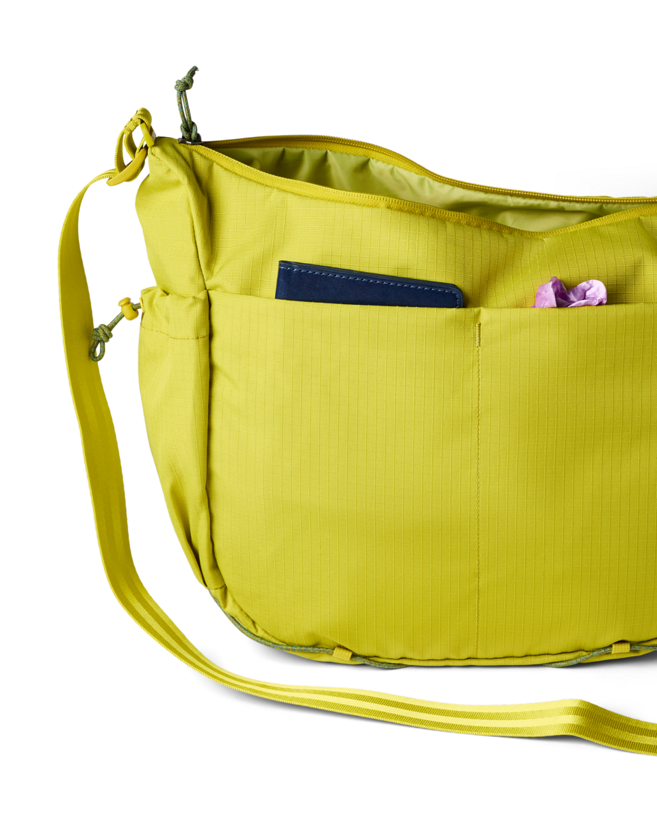 Cotopaxi Viaje 12L Shoulder Bag in Citron — interior view