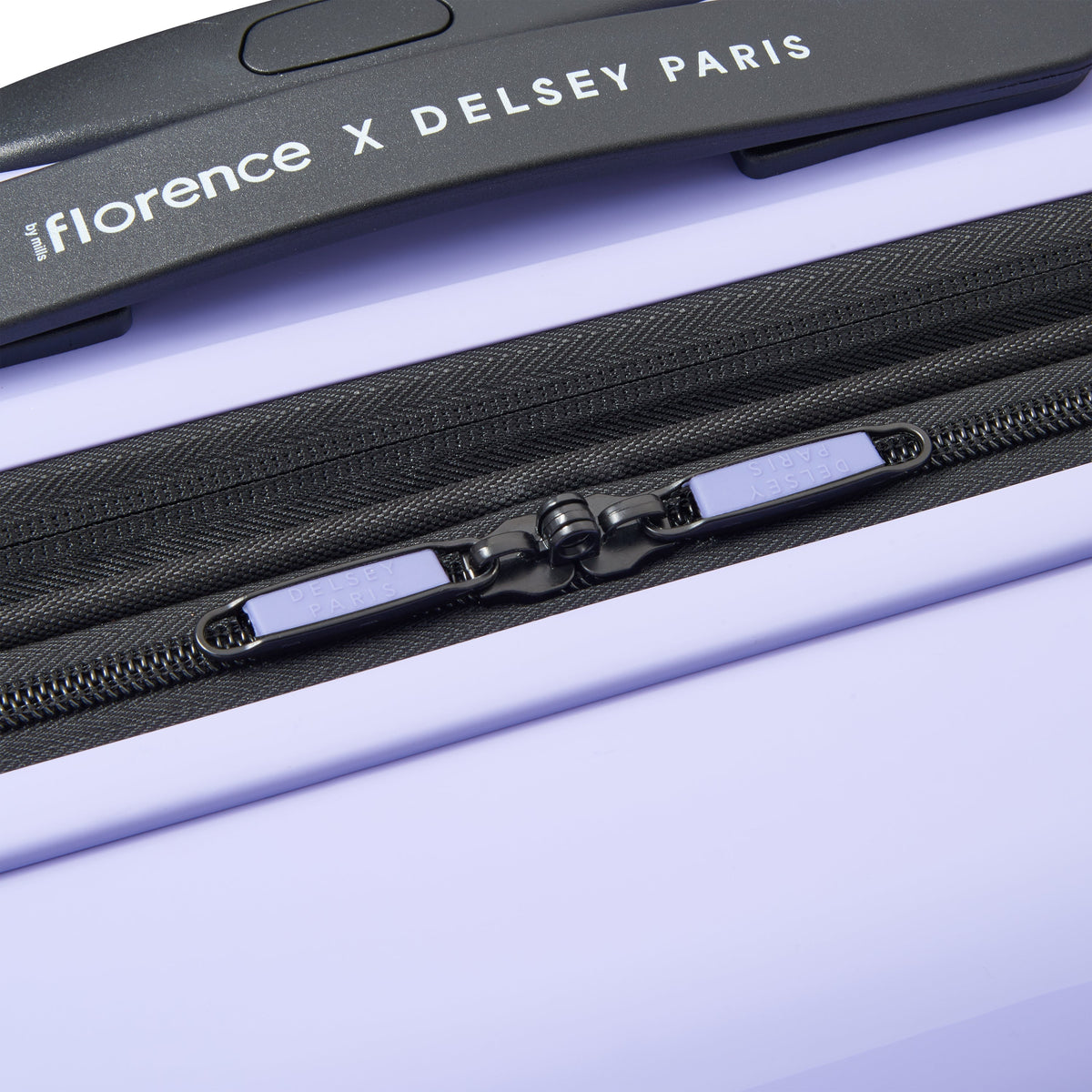 Delsey Spin Me Away Carry-On Plus Expandable Spinner in Lavender — detail view