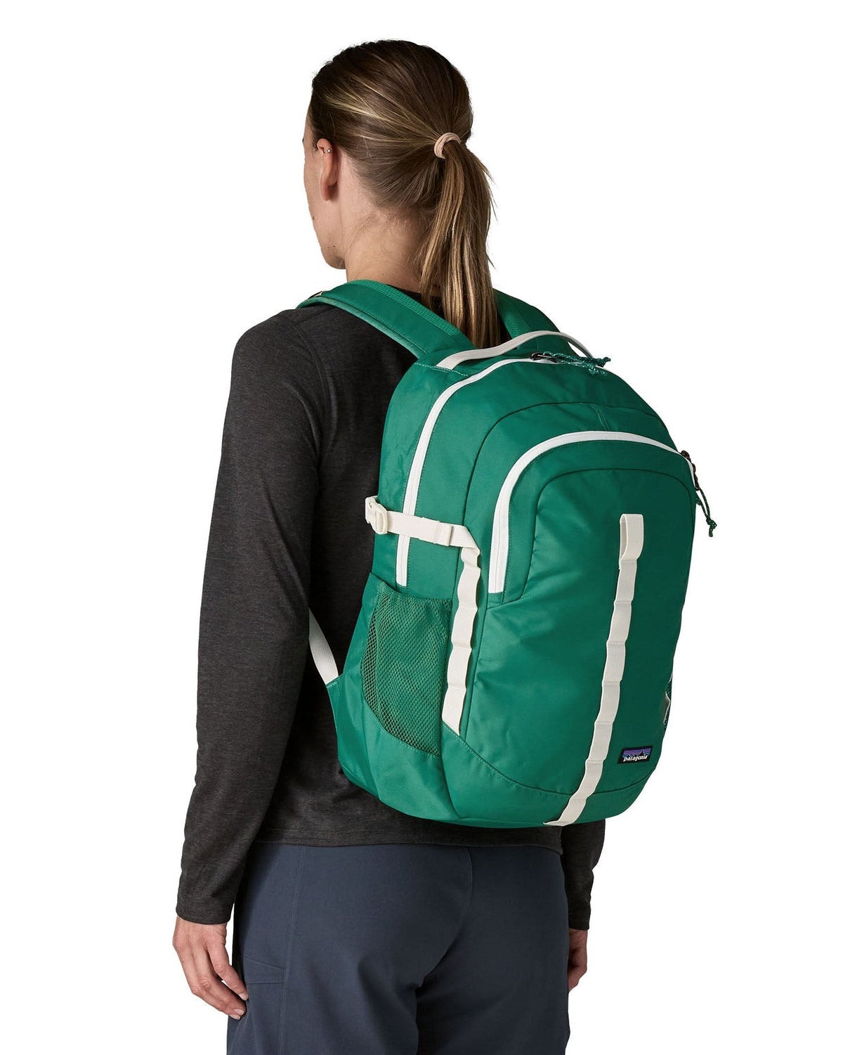 Patagonia Refugio Daypack 26L in Gem Green — lifestyle
