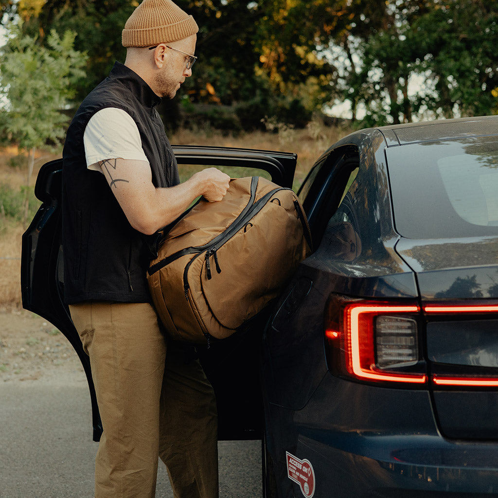 Peak Design Travel Backpack 45L in Coyote — lifestyle 4