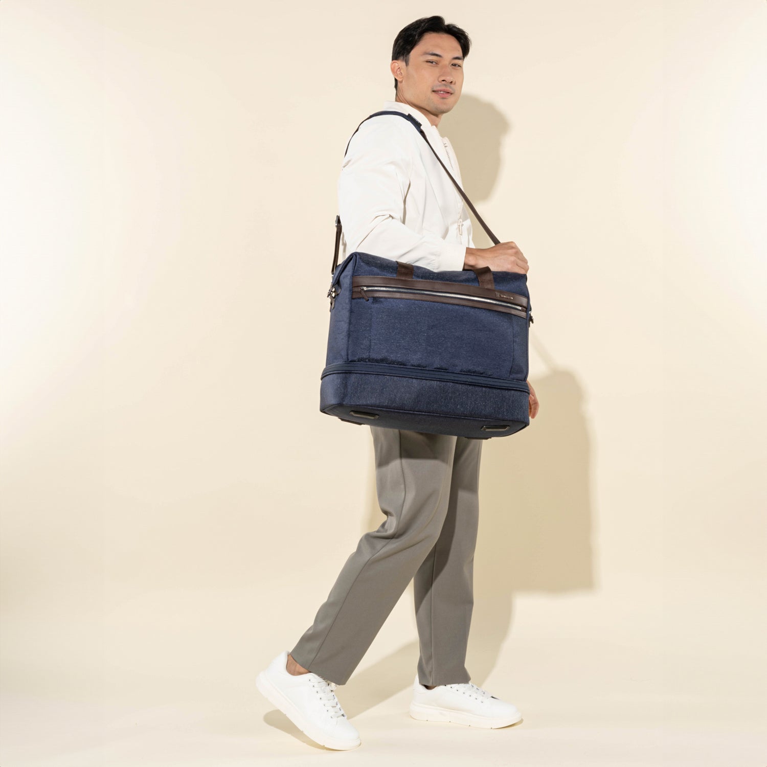 Travelpro Platinum Elite Drop-Bottom Weekender in True Navy — lifestyle