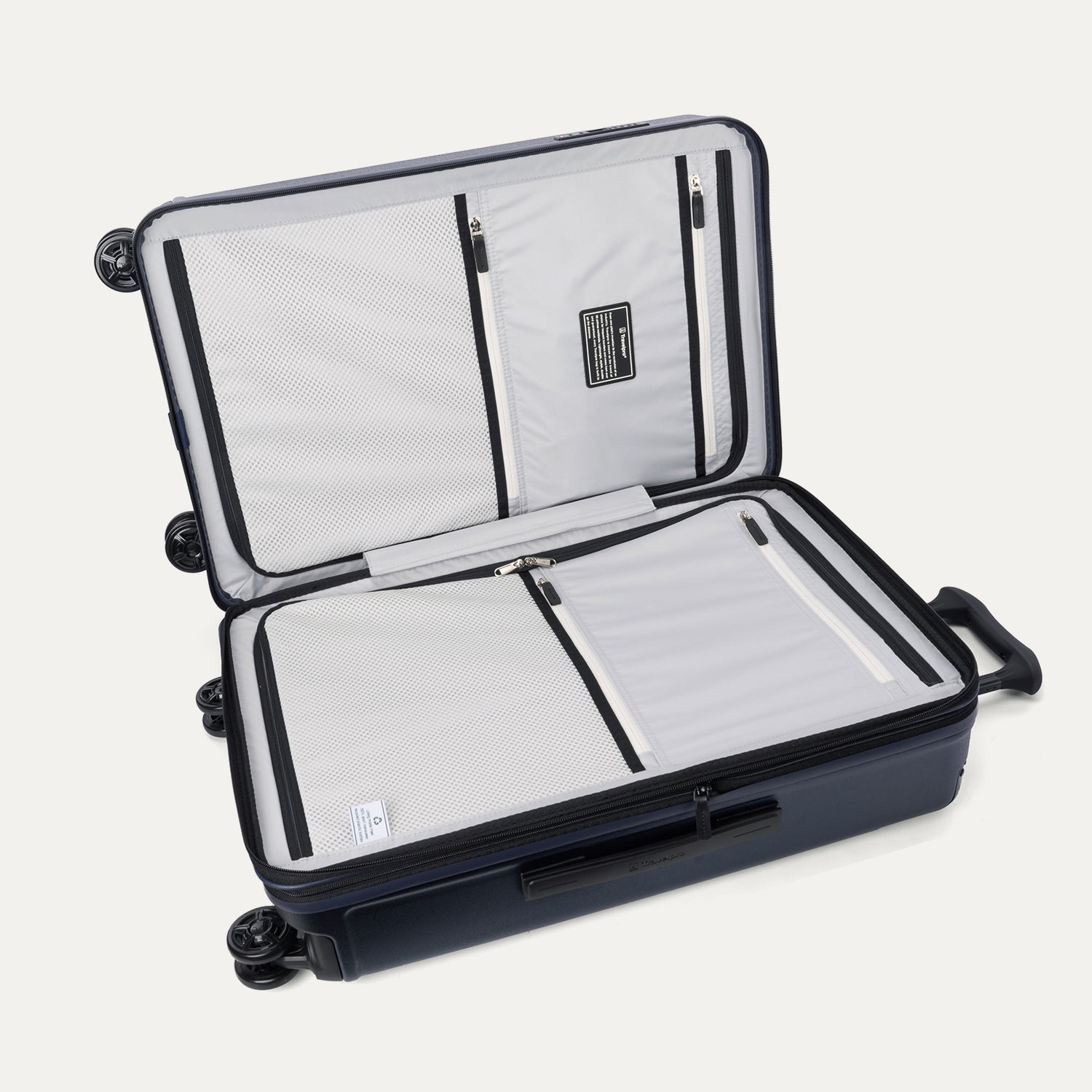 Travelpro Platinum Elite Hardside Medium Check-In Expandable Spinner in Aviator Navy — interior view