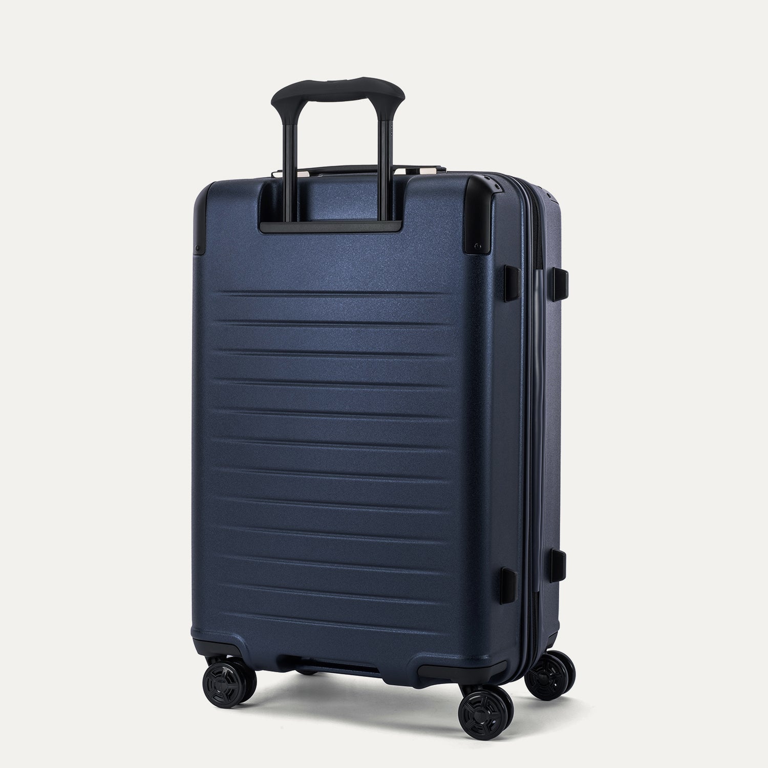 Travelpro Platinum Elite Hardside Medium Check-In Expandable Spinner in Aviator Navy — back view