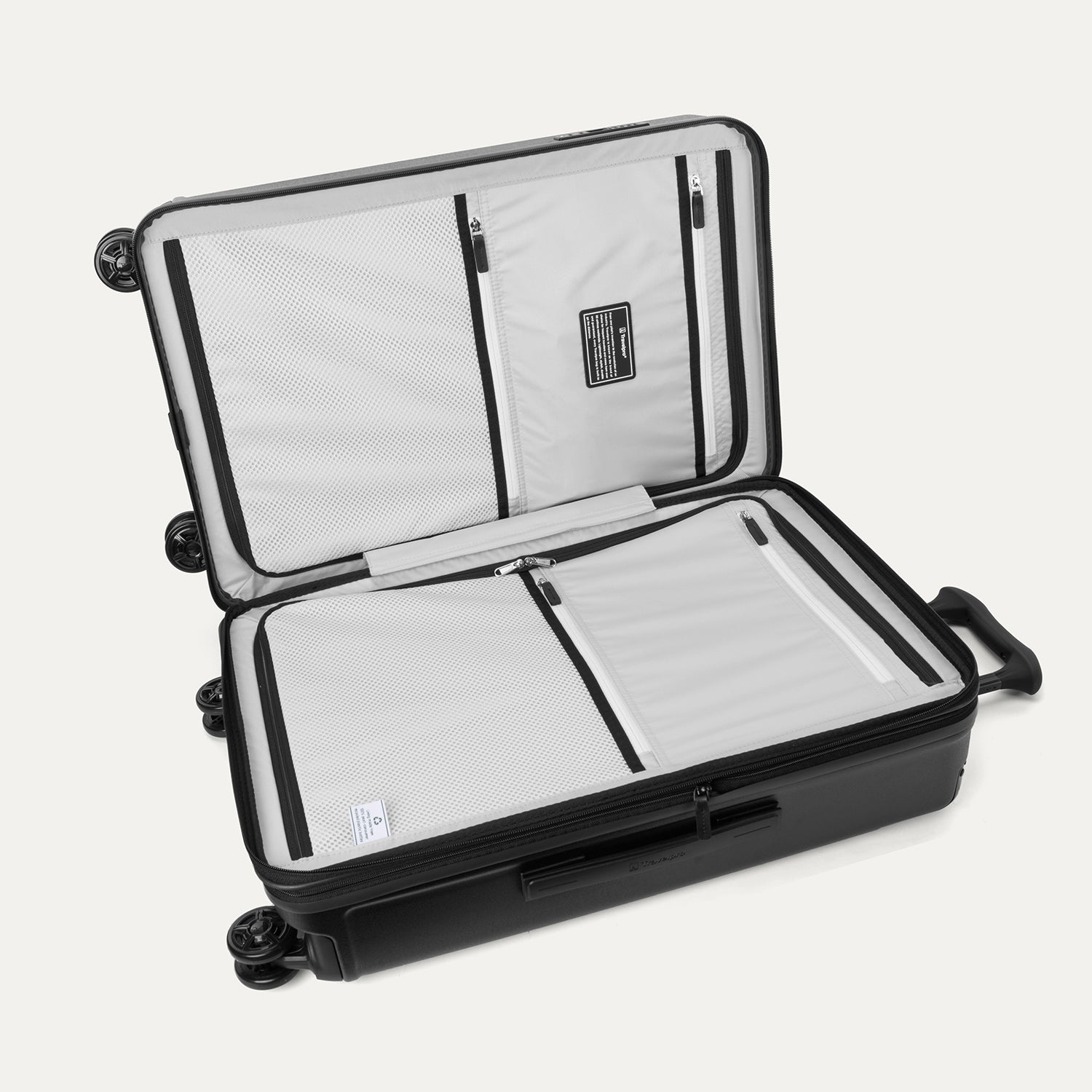 Travelpro Platinum Elite Hardside Medium Check-In Expandable Spinner in Jet Black — interior view