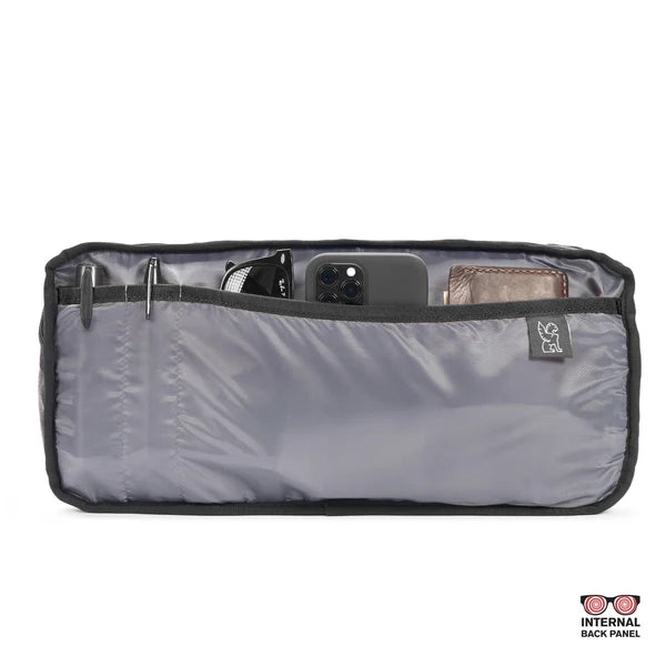Chrome Industries Kadet 9L sling bag – blue, open showing the interior