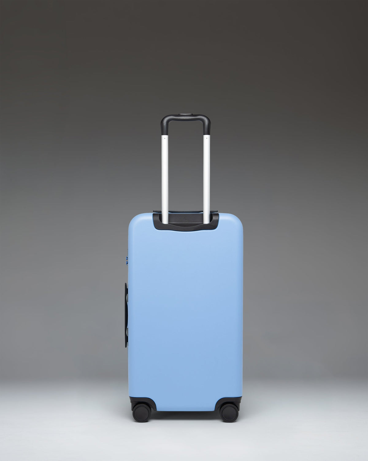Herschel Heritage Hardshell Medium Luggage 67L in Light Blue — back view