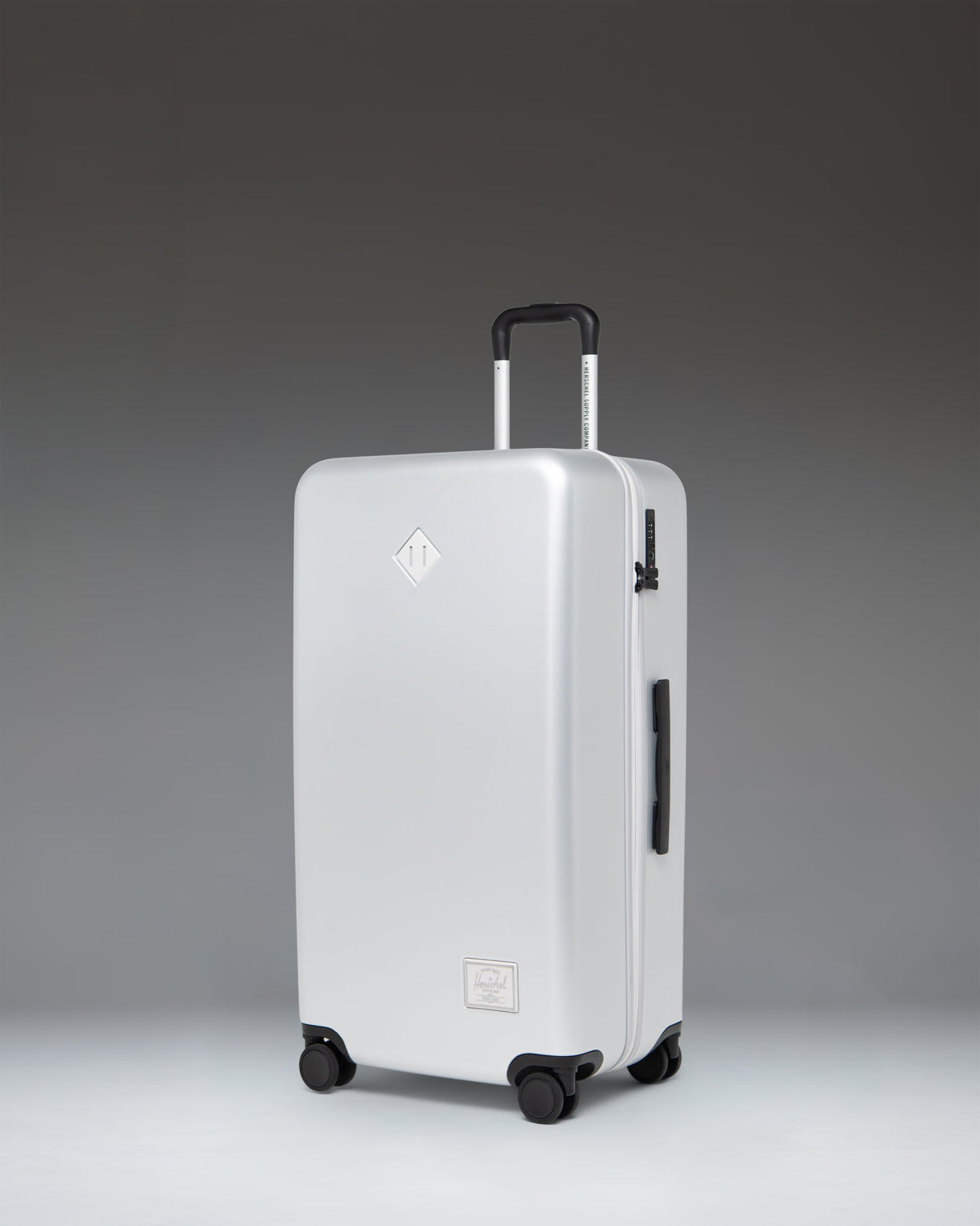 Herschel Heritage Hardshell Large Luggage 95L in Silver — angle view