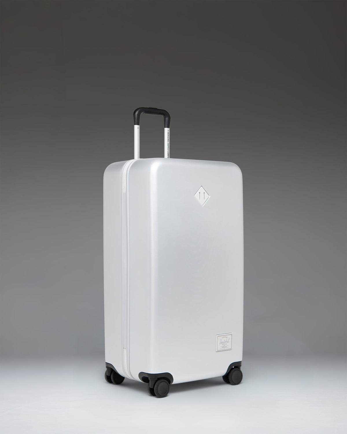 Herschel Heritage Hardshell Large Luggage 95L in Silver — angle view 2