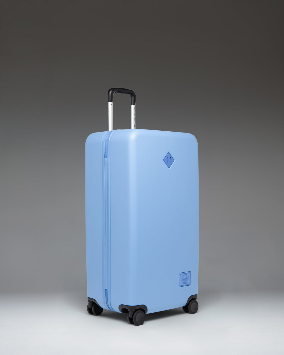 Herschel Heritage Hardshell Large Luggage 95L in Light Blue — angle view 2
