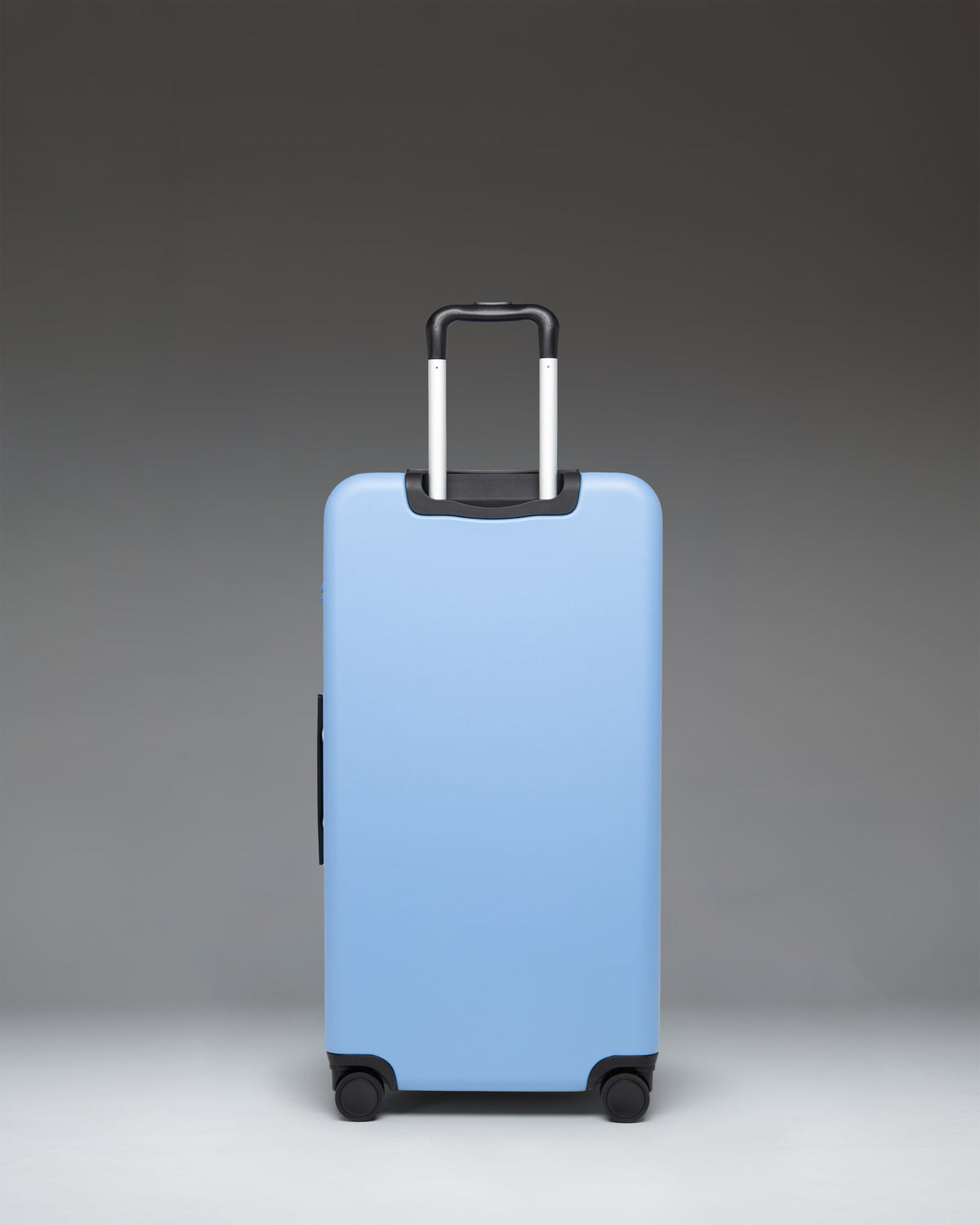 Herschel Heritage Hardshell Large Luggage 95L in Light Blue — back view