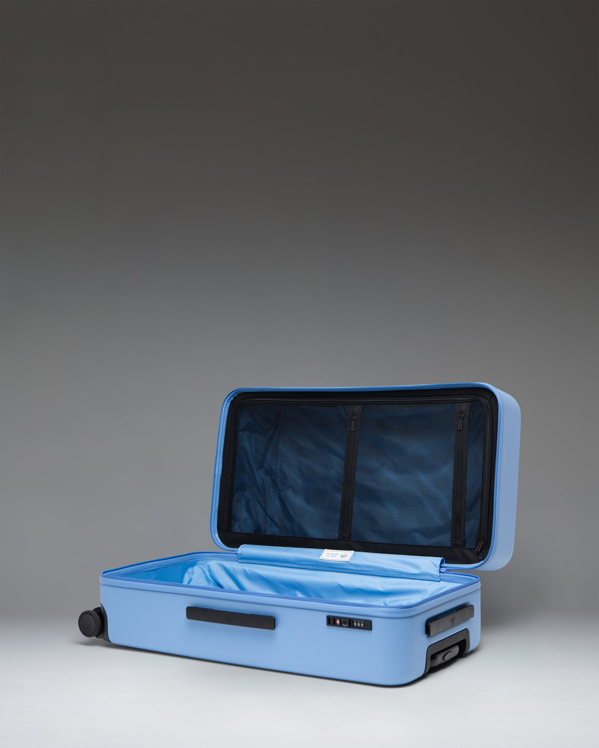Herschel Heritage Hardshell Large Luggage 95L in Light Blue — interior view