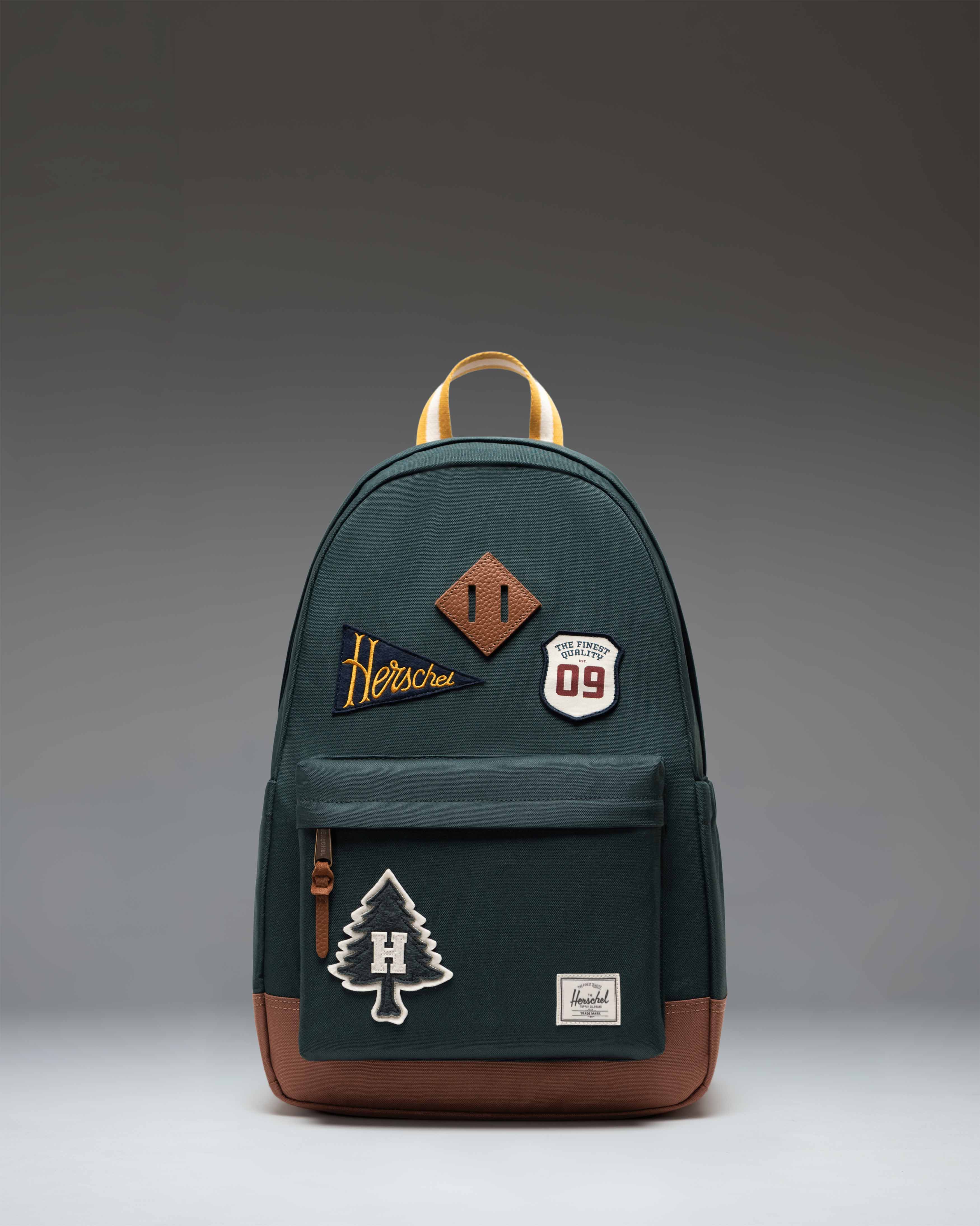 Herschel Heritage Backpack 24L in Patches Green Gables — front view # color_Patches Green Gables