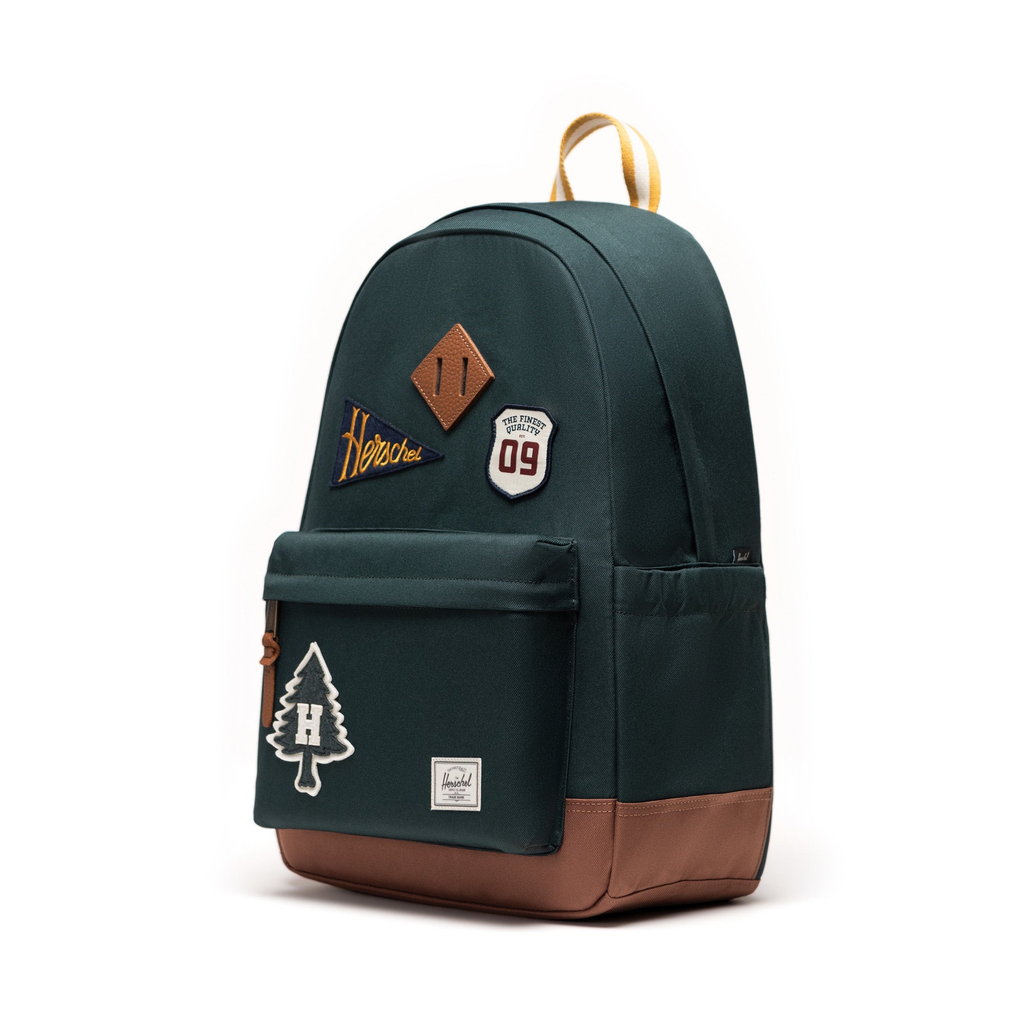 Herschel Heritage Backpack 24L in Patches Green Gables — angle view 2 # color_Patches Green Gables