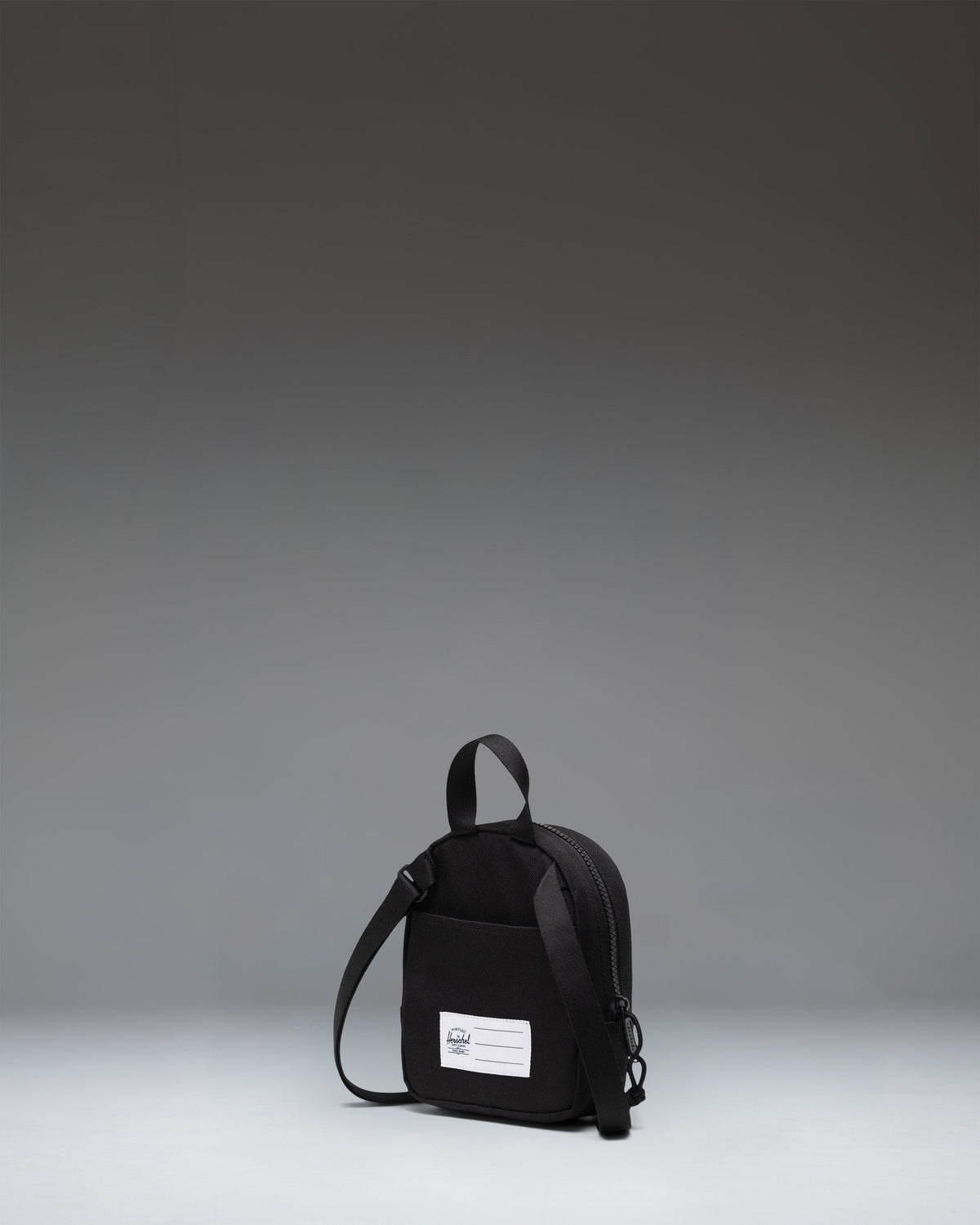 Herschel Heritage Crossbody Little Herschel 2L in Black — angle view 2