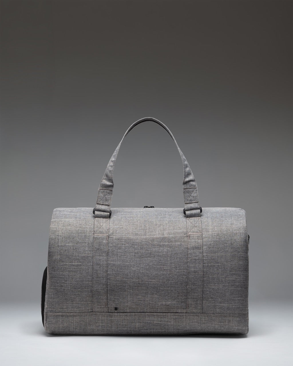 Herschel Novel Duffle Tech 45L in Raven Crosshatch — back view # color_Raven Crosshatch
