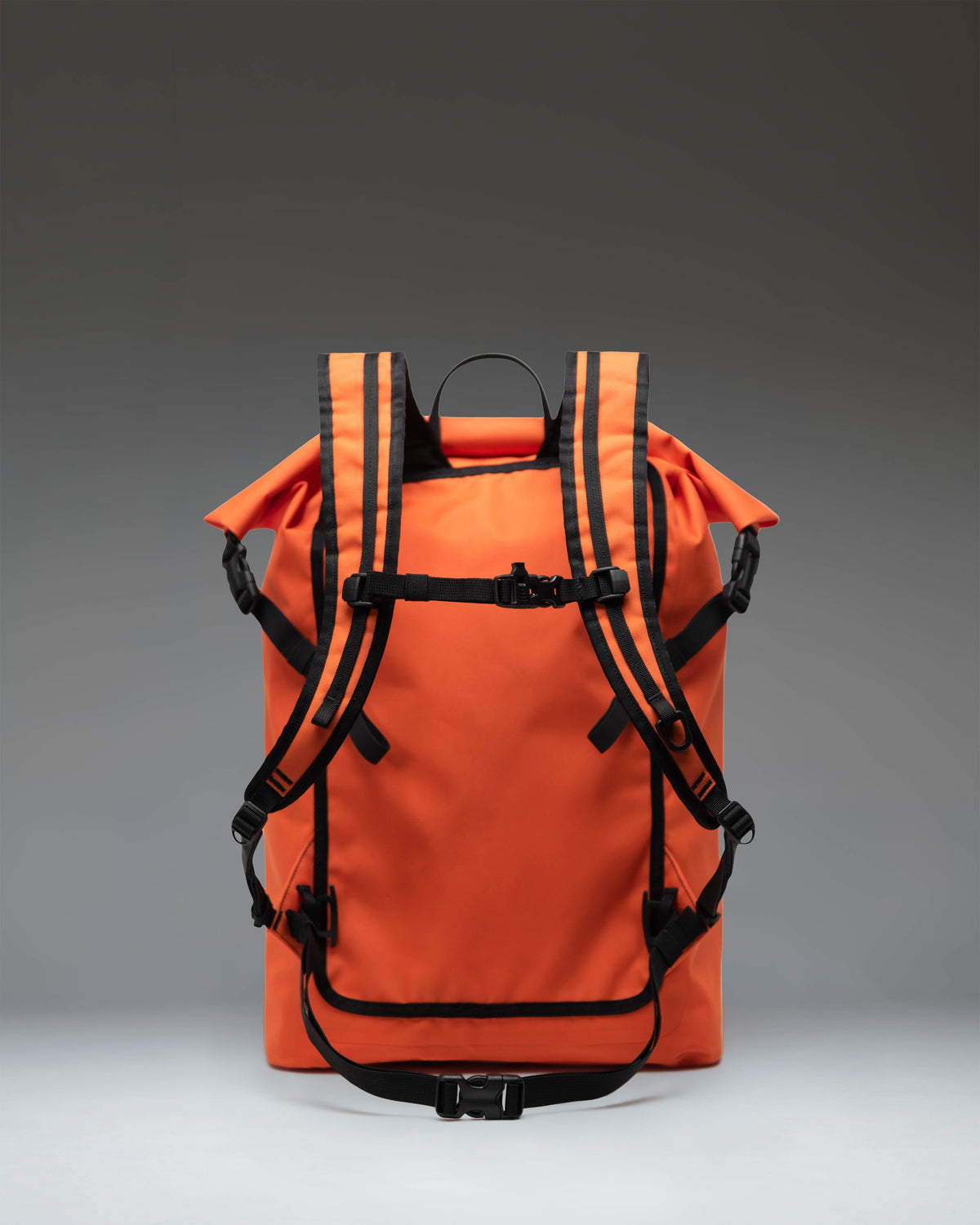 Herschel Dry Bag Backpack 32L in Vermillion Orange — back view # color_Vermillion Orange