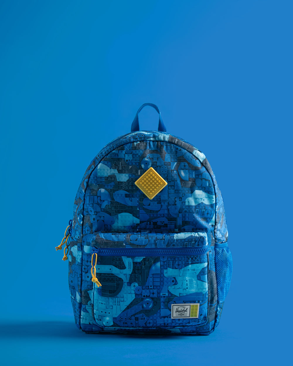 LEGO Herschel Heritage Youth Backpack 26L in Abstract Bricks Blue — front view