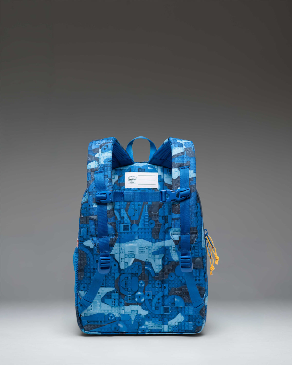 LEGO Herschel Heritage Kids Backpack 20L in Abstract Bricks Blue — angle view 2 # color_Abstract Bricks Blue