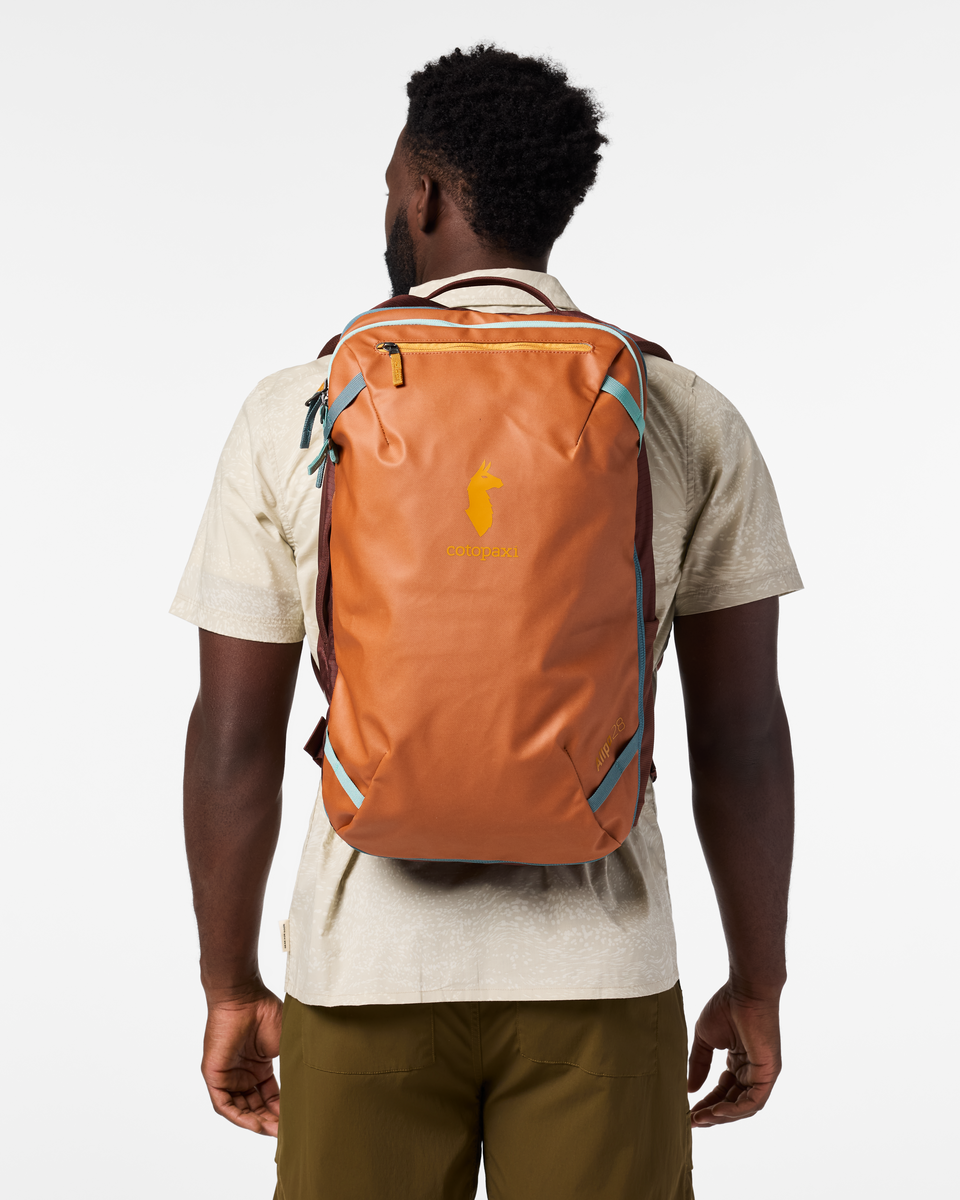 Cotopaxi Allpa 28L Travel Pack in Whiskey — lifestyle