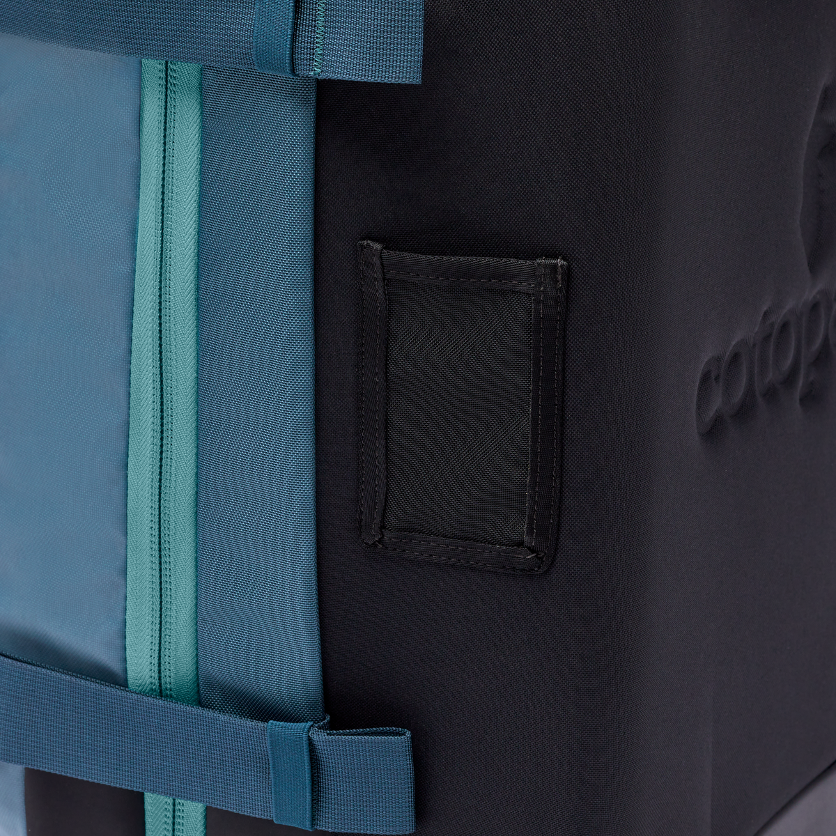 Cotopaxi Allpa 38L Roller Bag in Blue Spruce — angle view 4