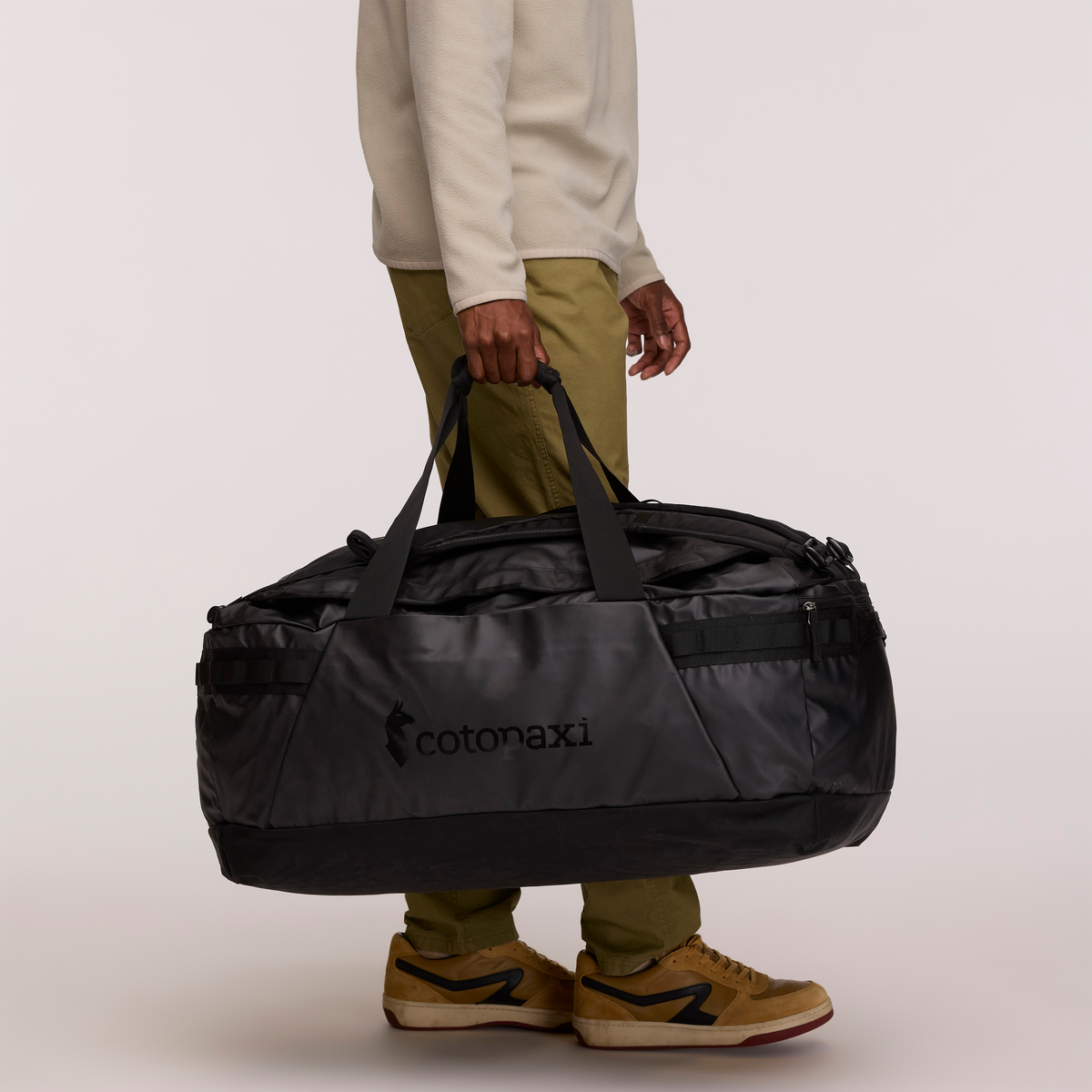 Cotopaxi Allpa Getaway 100L Duffel in Black — detail view