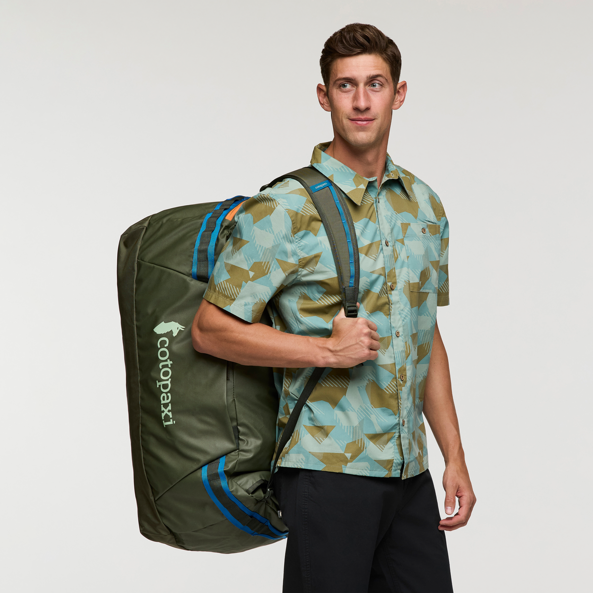 Cotopaxi Allpa Getaway 100L Duffel in Fatigue — detail view