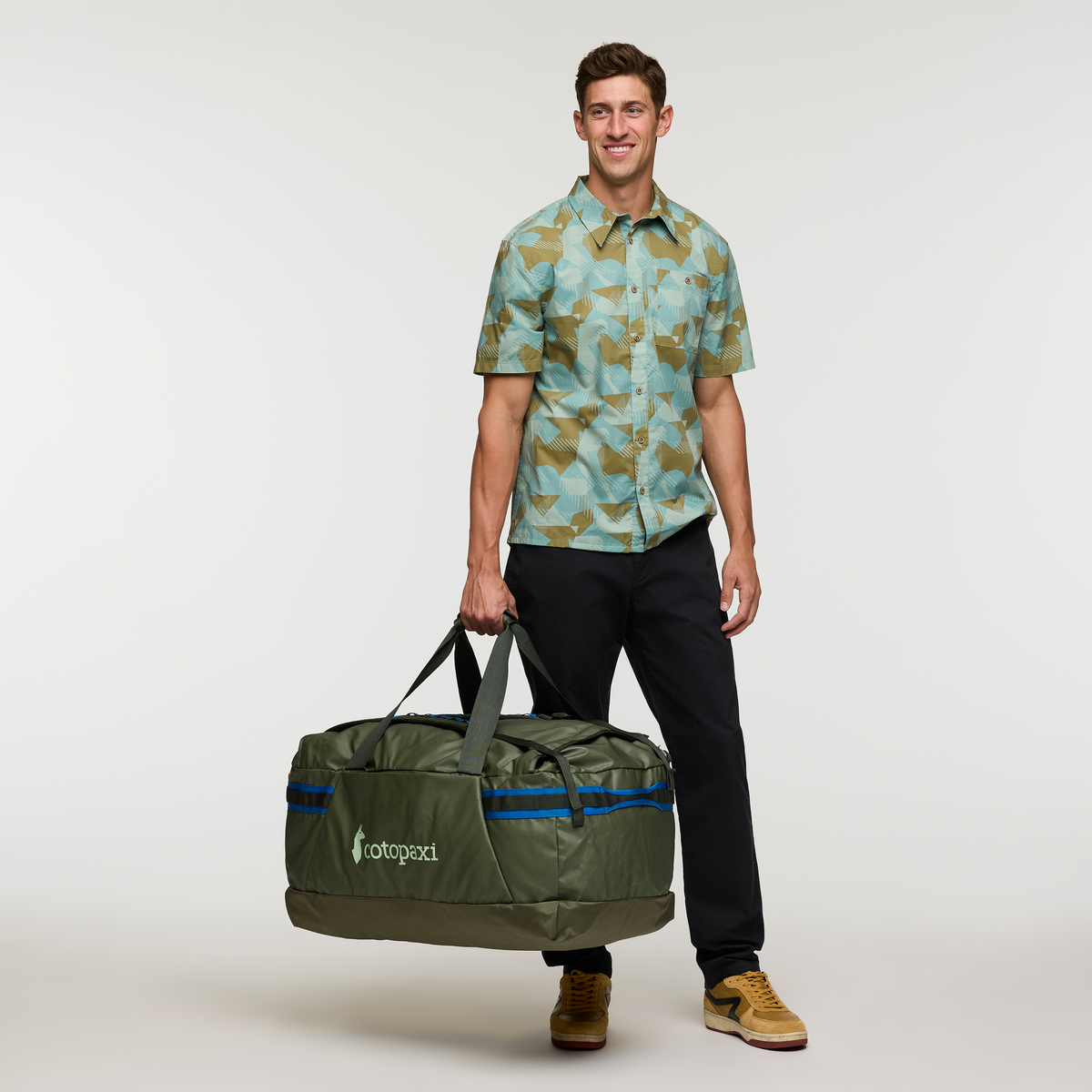 Cotopaxi Allpa Getaway 100L Duffel in Fatigue — lifestyle