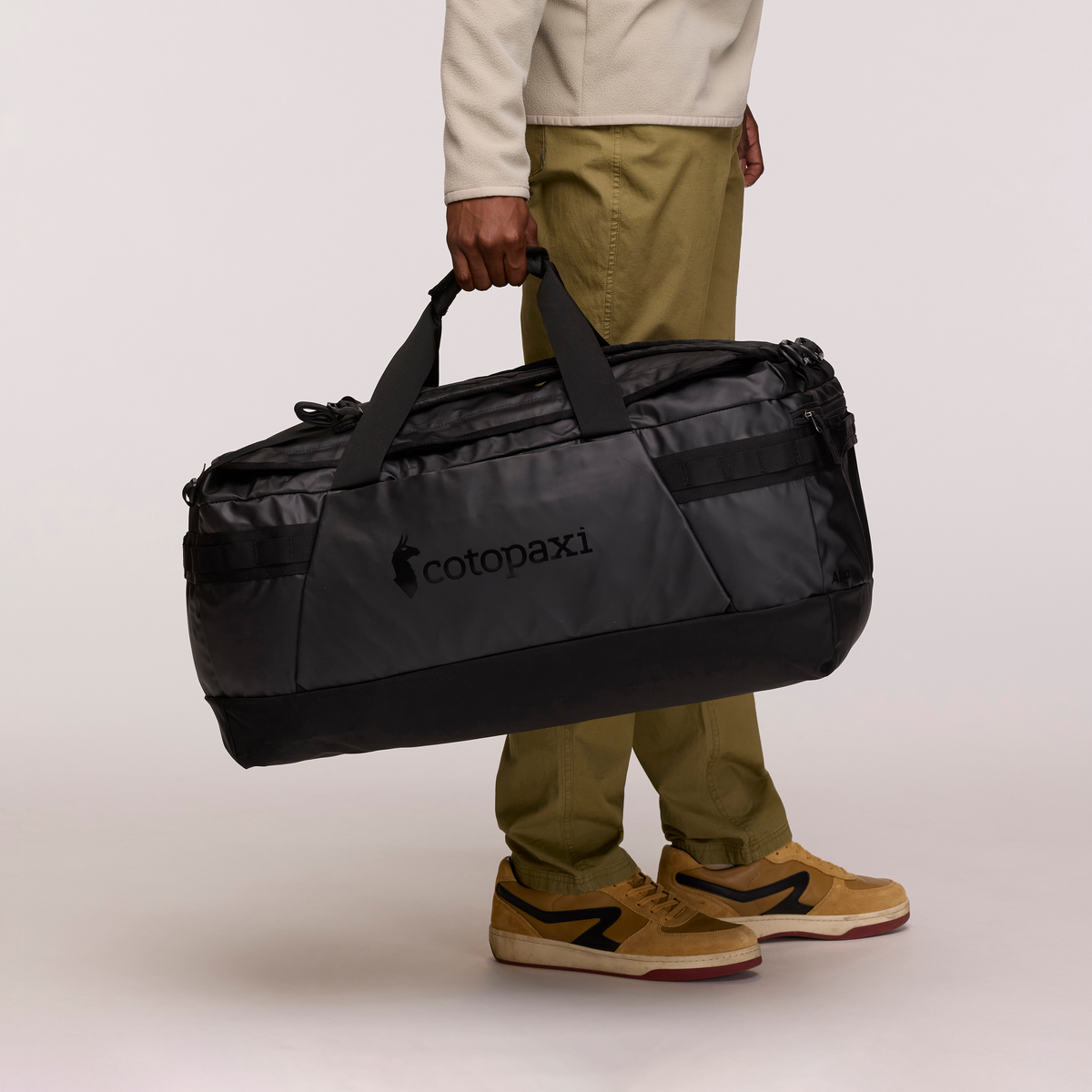 Cotopaxi Allpa Getaway 70L Duffel in Black — angle view 4