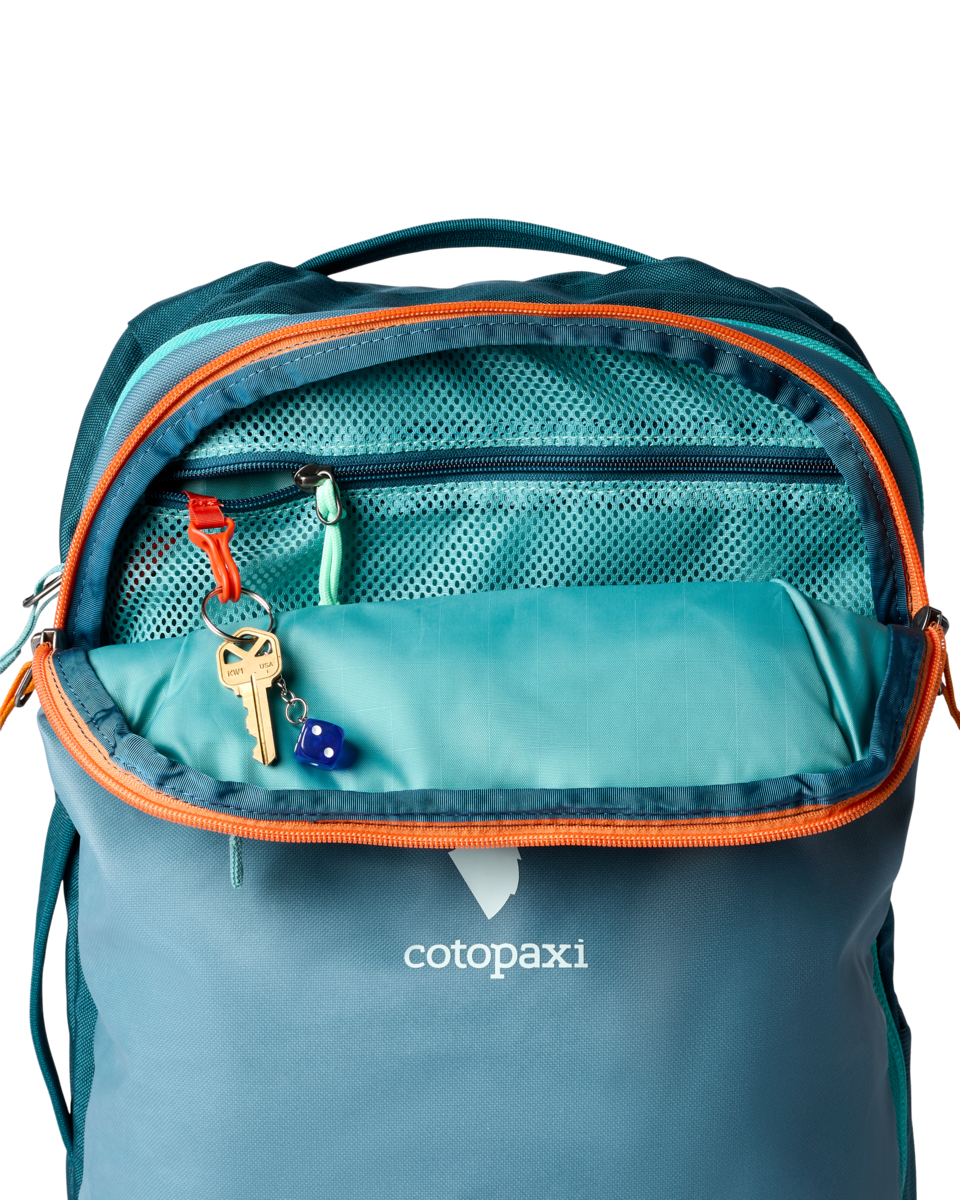 Cotopaxi Allpa 28L Travel Pack in Blue Spruce/Abyss — angle view 4