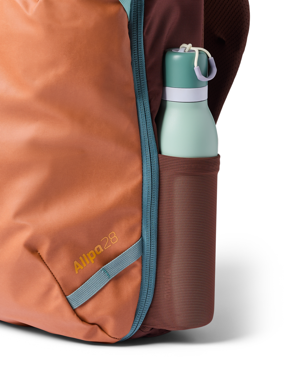Cotopaxi Allpa 28L Travel Pack in Whiskey — side view 2