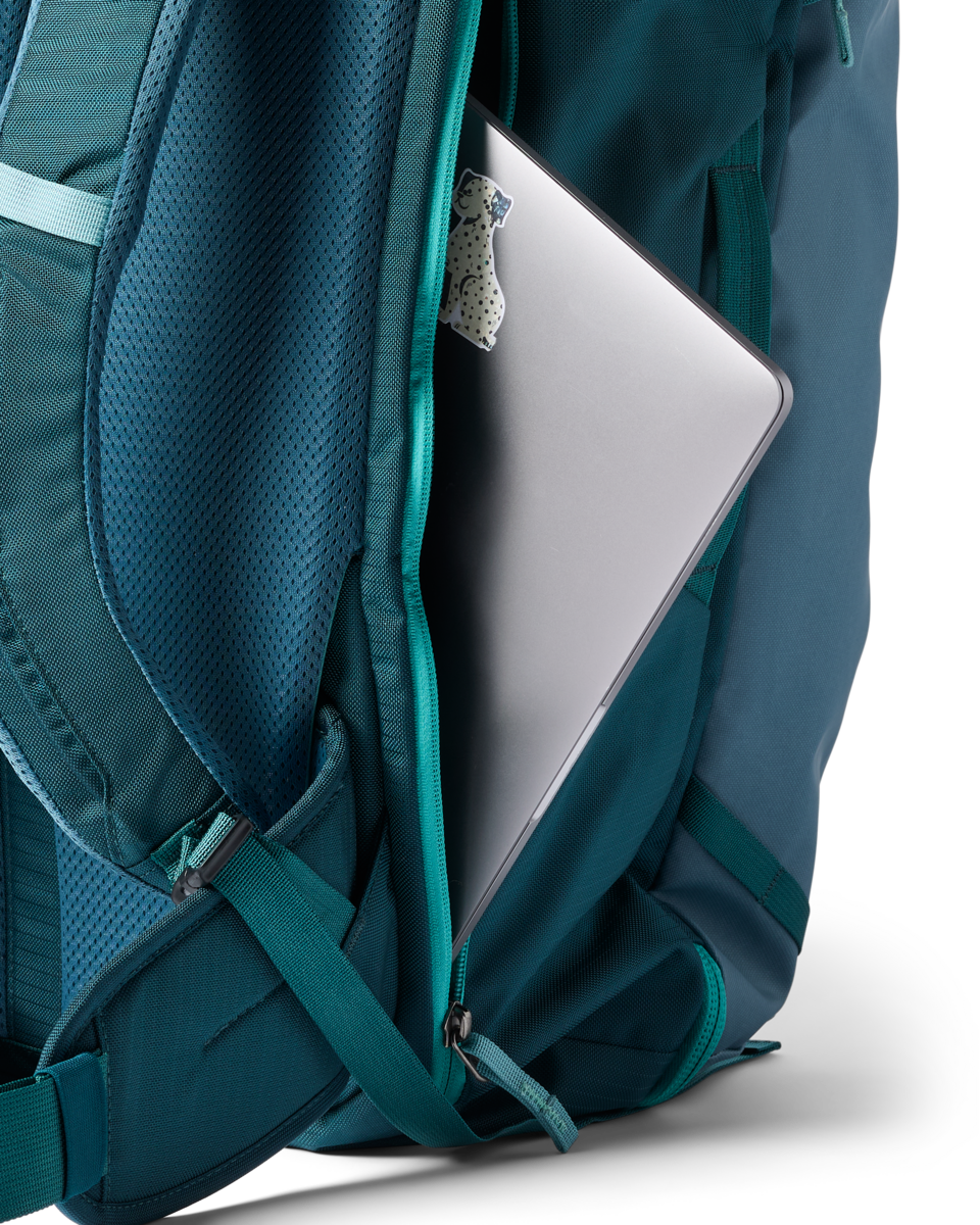 Cotopaxi Allpa 42L Travel Pack in Blue Spruce/Abyss — angle view 2